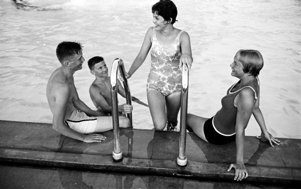 Attending the pool party for teenage members of the Maple Bluff Country Club and their friends are, center, Shirley Knudtson, Jeff Mucks, Eric Schubring and, right, Nancy Thomas.