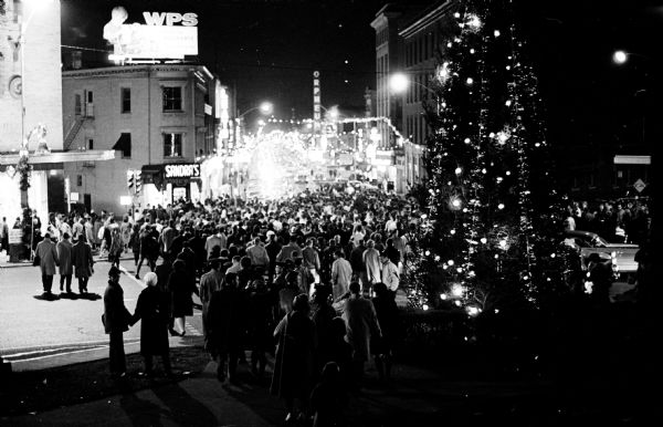 10,000 Badger football fans marching down State Street to celebrate Wisconsin's victory over Minnesota.