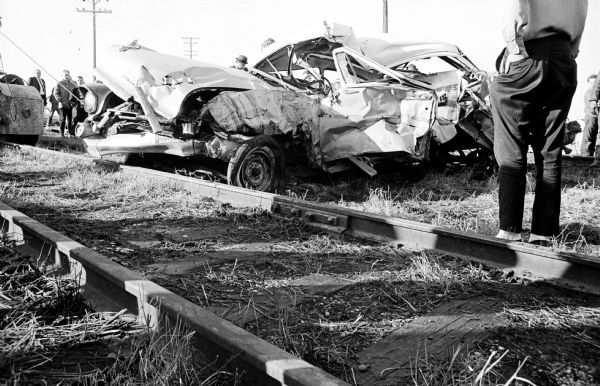 Daniel Coffey, an Ohio Chemical Company employee, suffered internal head and chest injuries and a fractured right leg when his 1957 Chevrolet was demolished by a North Western freight train at the Dempsey Road crossing on Madison's east side. The crossing only has a stationary cross-bar sign.  Engineer Ronald Caves and Conductor Evan Lewis, crew members of the 49 car, two engine freight headed for Milwaukee told police that the train whistle was blowing when the accident occurred.