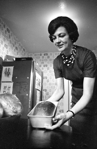 Phyllis Wallenfeldt, wife of Milton College president Dr. Evert Wallenfeldt, is shown in her kitchen at home. Phyllis is known for her baking.