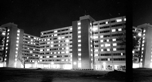 A night photograph of the new Sellery Hall dormitory at the corner of University Avenue and Johnson Street.