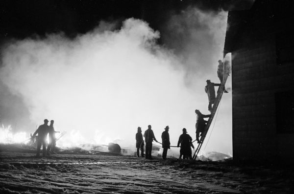 A $100,000-$150,000 fire destroys a lumber storage shed and its lumber and building supply inventory in downtown Sun Prairie. More than 100 firemen battled the blaze while over 5,000 spectators watched.