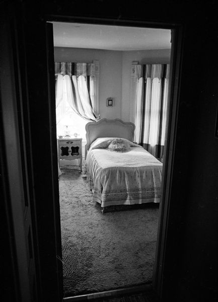 Master bedroom in the George Fitts family's rented brick farmhouse on Old Sauk Road near Gammon Road. The farmhouse was originally owned by Carl Meyer.