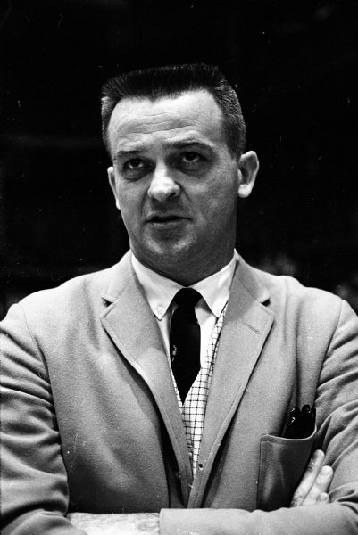 Milwaukee North High School boy's basketball coach Vic Anderson.  Milwaukee North participated in the 1964 WIAA state basketball tournament held at the U.W. Field House, and lost the state championship game to Dodgeville High School, 59-45.