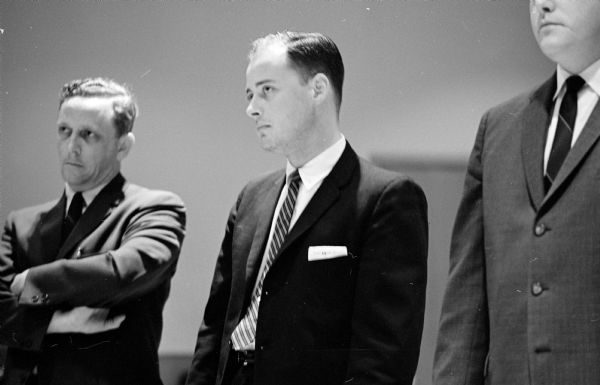 Thomas F. Howard (R) standing with his attorney, Richard E. Lent (L) during a court hearing on charges of abduction of a 2-year-old girl from in front of her home at 619 S. Orchard Street. Howard pleaded innocent to the charges.