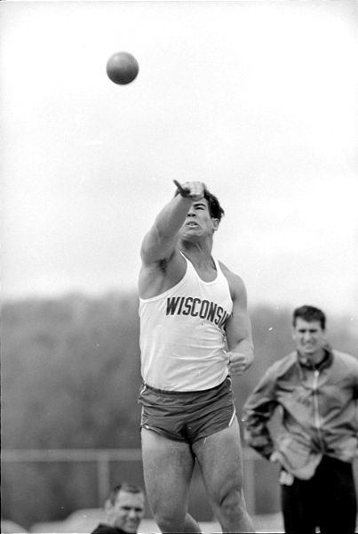U.W. track athlete Jim Sternfield throwing the shot put during a dual meet with Minnesota at the U.W. track. Sternfield placed third in the discuss event. Wisconsin won the meet 93-47.