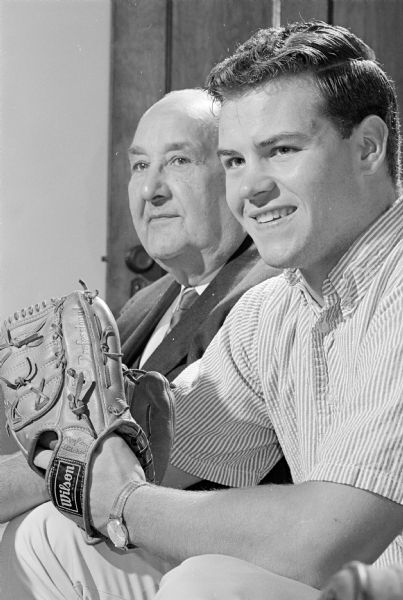 University of Wisconsin football and baseball star, Rich Reichardt (R), is shown with his Grandfather Ed Reichardt. Rich lived with his grandfather for three years while attending the U.W.