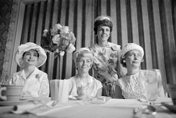 New officers of the Who's New club are shown at the spring luncheon at Maple Bluff Country Club. L to R: Peggy Snodgrass, secretary; Frances Barnes, assistant treasurer, Nancy Lager, President; and Margaret Hake, vice-president.