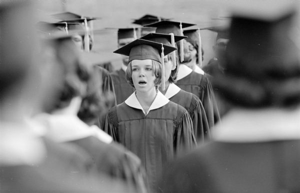The "Crusader Hymn" has a special meaning for these 1964 Edgewood High School graduates.