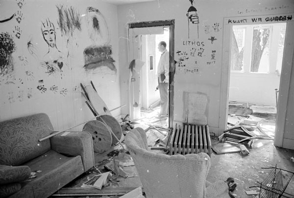 Interior view of the results of a "demolition party" of about 50 university-aged youths who wrecked the two-story apartment building, 413 Fitch Court, without permission of the new owner, John W. Meier, owner of the Kollege Klub, who planned to rent the building for a semester or two before tearing it down for parking space.
