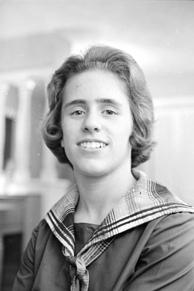 Marjorie McGettigan, an eighth grader at Our Lady Queen of Peace school, who will be thirteen on Friday the thirteenth.