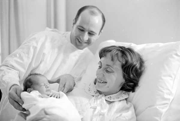 Jayne Elizabeth Hopkins arrived at 3:14 a.m. at Methodist Hospital to be the second baby born in 1965 in Madison.  She is the daughter of Frances and Steven Hopkins. Steven is a <I>Wisconsin State Journal</I> assistant state page editor.