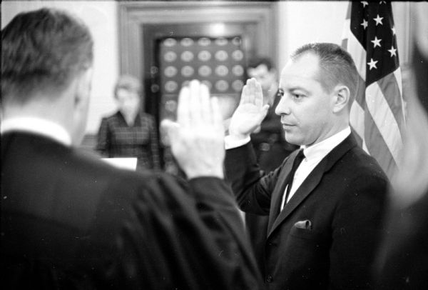 John H. Bowers being sworn in by Judge Nathan Heffernan as Wisconsin Deputy Attorney General.