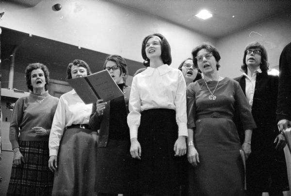 Singing in the Madison Civic Opera's chorus in the production of "Falstaff" are, left to right: Charlotte Newton, Ann Crow, Mrs. Thomas Chalfant, Sandra Kwiecinski, Alice Hansen and Grace Schumpert.