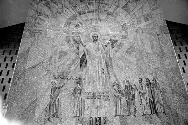 A mosaic designed by Felix G. Senger measuring 24 by 30 feet and composed of 360,000 pieces of mosaic was installed in the new chapel of Holy Name Seminary. The mosaic was assembled by the August Wagner Institute for Mosaic and Glass in Berlin, Germany. After assembly, it was disassembled into 500 large sheets and the Roehm Tile and Mosaic Company, Wisconsin Dells, installed the mosaic in December.