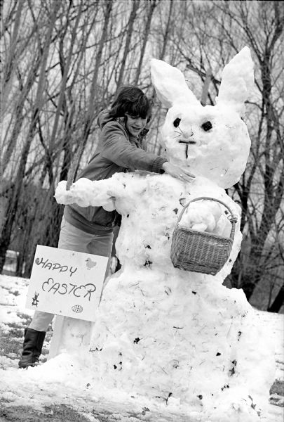 Hanna Fritz building an Easter Rabbit out of snow after a snowfall of 2 inches in mid-April.