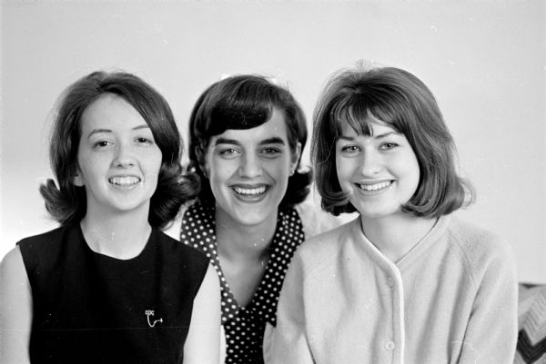 Committee plans alumnae tea for the Chi Omega Chi (Catholicc Daughters' Club) to be held at the home of Sue Brausen, 402 S. Midvale Blvd. Those planning the tea are (L-R) Barbara McKee, Rt. 2, McKee Road, president; Janet James, 3311 Harvey Street, general chairman; and Julie Cochems, 705 S. Prospect Avenue, secretary.