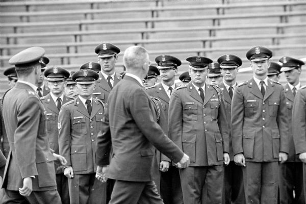 U.W. Chancellor R.W. Fleming is shown inspecting U.W. Air Force cadets at a ROTC review.