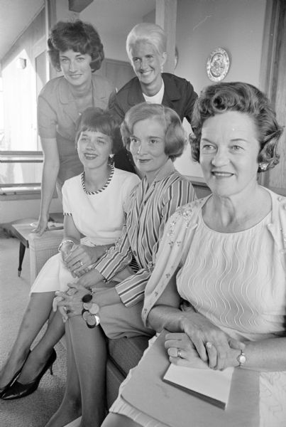 The new officers of the Madison Alumnae Panhellenic Council are, sitting, left to right: Mrs. William C. Dries, president; Mrs. Al Cole, vice-president; and Mrs. James Geisler, secretary. Standing are, left to right: Mrs. Donald Johnson, membership chairman; and Mrs. Robert Feirn, publicity chairman.