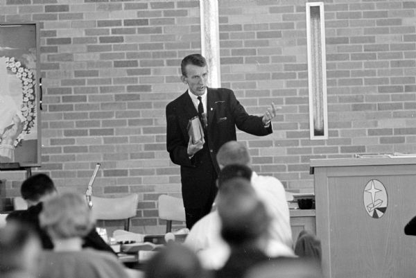 The Rev. Harley Siggum explaining a biblical concept to pastors attending a bible study course offered by the Adult Christian Education Foundation held at Bethel Lutheran Church.