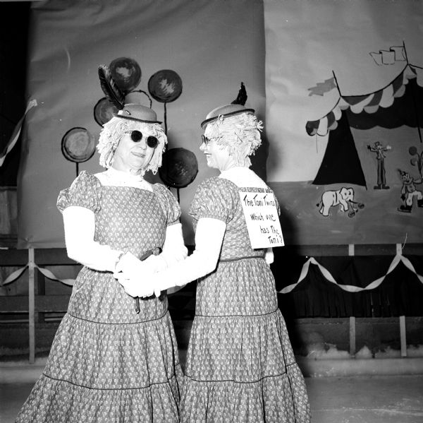 Members of the Madison Figure Skating Club held their annual winter party at the Truax Field Arena. The event was organized on a circus theme. Marie McNeil and Lily Degan -- The Toni Twins -- had fun asking "Which one has the Toni?" a handwritten sign taped to their backs referring to an advertisement for a hair permanent treatment.