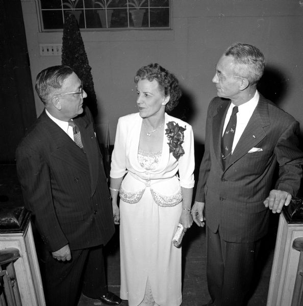 Members of the Capital City Chapter of the United Commercial Travelers Association attending a banquet at the Park Hotel. Left to right are: the guest of honor, George Limpert (from Appleton), his daughter, Louise, and Lee Watts. 
