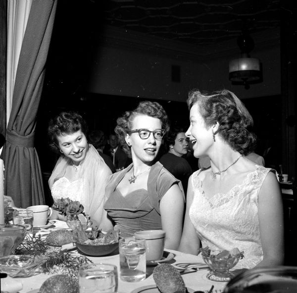 Members of the Capital City chapter of the United Commercial Travelers Association attending a banquet at the Park Hotel. Left to right: Muriel Heim, Mrs. LaVerne Wickersham, Monroe, Wisconsin, and Mrs. Douglas Showers.