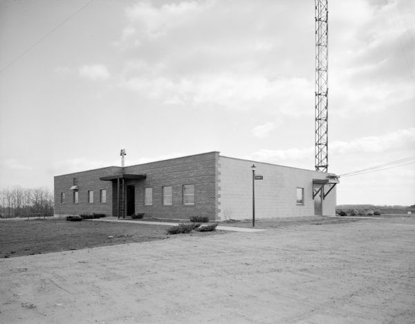 The new WKOW-TV Studio located on Gilbert Road. The tall television antenna is jutting up from behind the building.