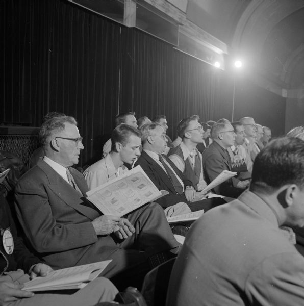 The local group for the Society for the Preservation and Encouragement of Barbershop Quartet Singing in America (SPEBSQSA) rehearsing for an international contest in Washington, D.C. Members shown are (left to right): Robert Davis, Archie Hawkes, James Lauridsen and John A. Bremer.  