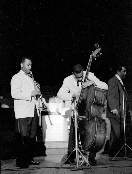 Duke Ellington jazz big band performing at the University of Wisconsin Stock Pavilion. Pictured are clarinetist Jimmy Hamilton and bassist Wendell Marshall.
