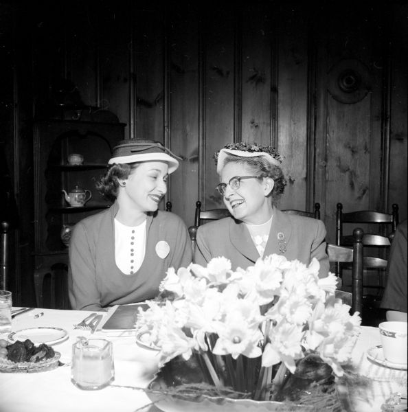 Wives of members of the Downtown Optimist Club organized an auxiliary club called the Opt-mrs. The first luncheon meeting for the group was held at Kennedy Manor on Langdon Street. Shown at the head table are (left to right): Mrs. Richard Nickeson (4601 Gordon Avenue) and temporary chairwoman Mrs. Melvin C. Reppen (2801 Gregory Street).
