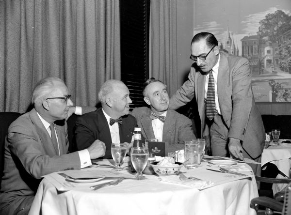 Indiana's Lieutenant Governor having lunch with Wisconsin officials. Left to right are: Arthur Wegner (Governor Walter Kohler's financial secretary), Indiana Lieutenant Governor Harold Handley, Wisconsin Attorney General Vernon Thomson, and <i>Wisconsin State Journal</i> writer, Sanford Goltz.