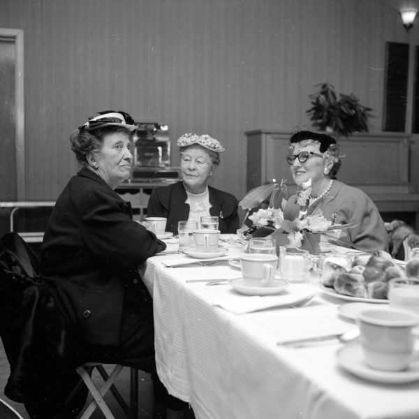 Annual Attic Angels Association, spring luncheon meeting held at the Blackhawk County Club. Shown are (left to right): Mrs. L.M. Hobbins, Mrs. Mary Esther (Vilas) Hanks and Mrs. Elsie Ida (Baragwanath) Brandenburg.