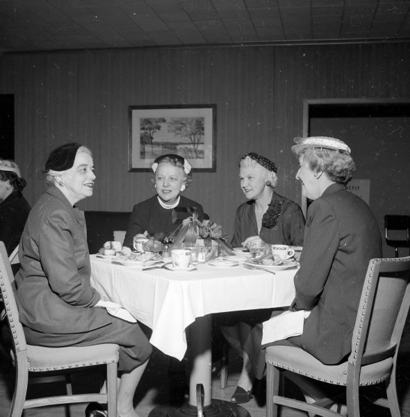 Annual Attic Angel Association, spring luncheon meeting held at the Blackhawk Country Club. Shown are (left to right): Mrs. M.S. Tegge, Mrs. Inez Toebaas, Mrs. Mary Rennebohm and Mrs. James Law.