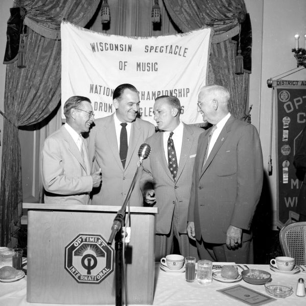 The four top guests at the meeting are (left to right): George Browne (of Indianapolis, Indiana), past president of Optimists International; Madison Mayor George Forster; Maurice Perkins (of Louisville, Kentucky), honored guest speaker and president of Optimist International; and Melvin Reppen, a member of the International Board of Directors.