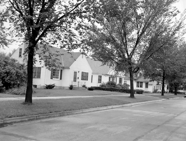 Houses along a Madison residential street where carriers deliver the <i>Wisconsin State Journal</i> on their paper route.