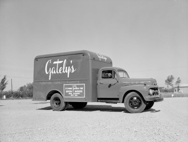 View of passenger side of delivery truck for Gately's Furniture Company, located at 5005 West Beltline Highway.