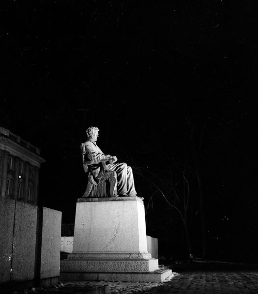 View of the Lincoln statue with new lighting. The new amber lights were installed in late 1954 and are automatically turned on at dark by an electronic device, according to U.W. President E.B. Fred.