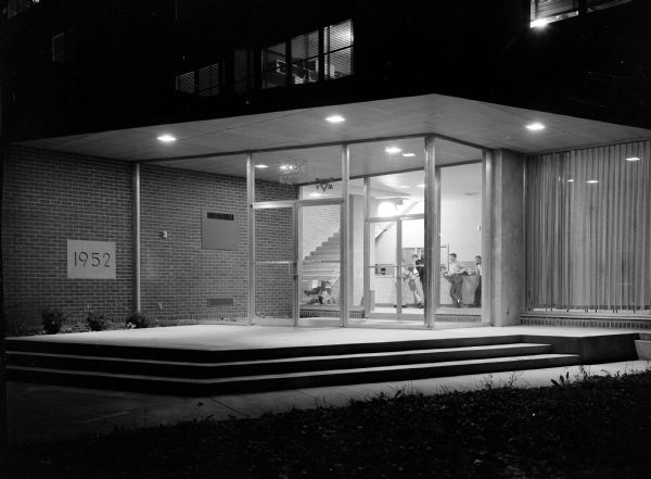 Night view of the front entrance of the University of Wisconsin YMCA at 306 North Brooks Street.