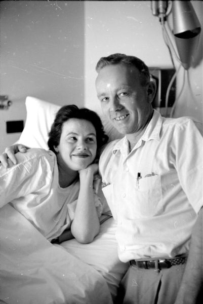 New parents, Max & Luella Steele, in hospital room. Their daughter was born on Friday, August 12, 1955. 