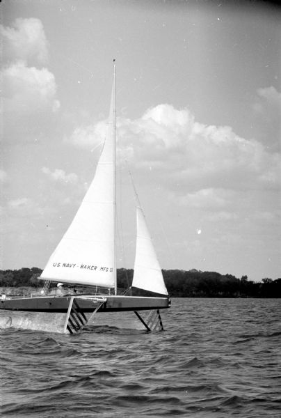 U.S. Navy hydrofoil, "The Monitor," built by Baker Manufacturing Company (Evansvile, Wisconsin) on Lake Mendota. Dubbed the "sailboat that flies," it had ladder-like hydrofoils on either side of the hull, propelling it more than 30 miles per hour. 