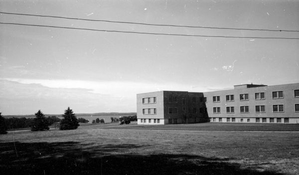 Lorenz Hall at Mendota State Hospital. The lake is in the distance.