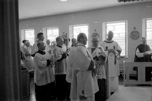 Catholic Bishop William P. O'Connor blessing the chapel at the new mother-house for the Sisters of St. Benedict located on County Highway M near Fox Bluff.