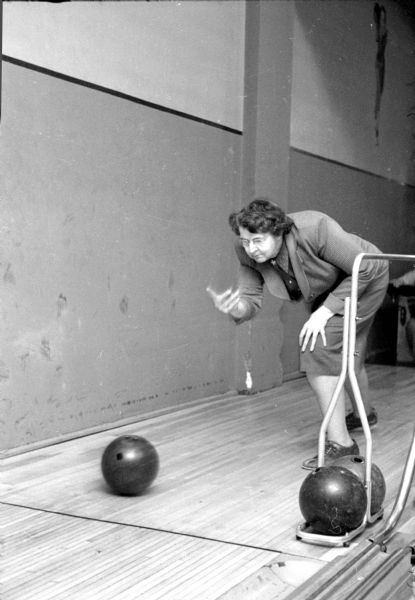 Mildred Finney releases a bowling ball. She is one of about fifteen visually impaired participants who gather weekly on Tuesdays at Playdium Alleys, located at 112 North Fairchild Street. None of the participants has vision better than 10 percent.