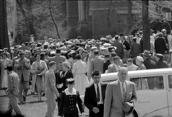 Hundreds of Easter church-goers crowd the intersection of Wisconsin Avenue and Gorham Street on Sunday morning.