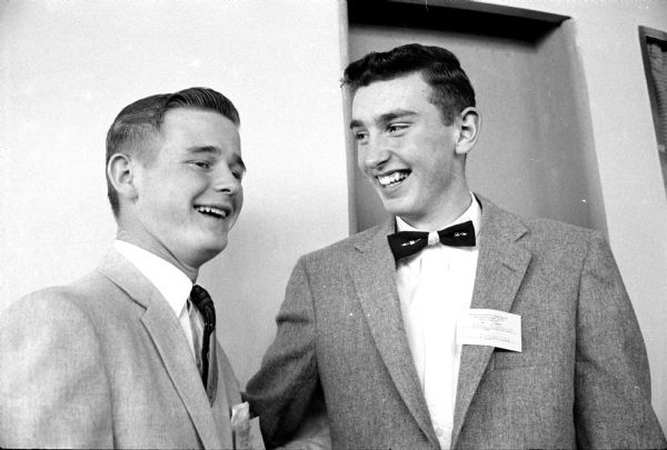 Attending the 5th Annual Governor's Conference on Children and Youth at the U.W. Memorial Union are Keith Nelson (left) and Donald Dunbar (right) from Dodgeville, Wisconsin. The conference was attended by about 1,700 adults and high school students.