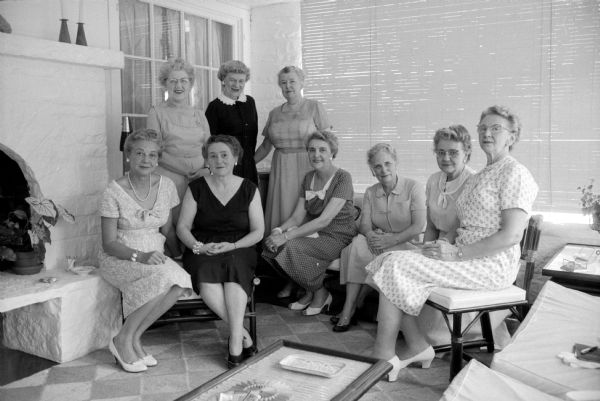 Members of the board of the Madison Civics Club gather for a pre-season meeting at the home of the board chairman, Mrs. Thomas R. Hefty, at 31 Paget Road. Shown seated are (left to right): Mrs. Hefty; Mrs. Ray Brown (113 Elm Street); Mrs. James Law (2011 University Avenue); Mrs. O.L. Bock (19 Paget Road); Mrs. John E. Wise (2238 Eton Ridge); and Mrs. Burr McWilliams (118 Breese Terrace). Shown standing are (left to right): Mrs. R.W. Niederer (1614 Adams Street); Mrs. W.H. Lewis (4144 Council Crest); and Mrs. Walter Ela (2010 Van Hise Avenue).      