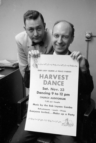 Our Lady Queen of Peace Parish holds a fall harvest dance in the church auditorium. Holding a poster for the dance are (left to right): James W. Gower, 625 Piper Drive, and Cyril J. Klingele, 4313 Doncaster Drive. The poster reads at the bottom: "$1.50 per couple - Music by Bob Leysen Combo . . . Everyone Invited . . . Make up a Party."