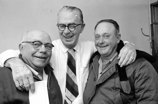 Group portrait of Joseph "Roundy" Coughlin with Mike Ubber and Ben Severson. They delivered $37.50 to "Roundy's Fun Fund." The caption states: "They (Ubber and Severson) are in charge of the dump on Olin Avenue and when people come there to get some articles Mike and Ben tell them there is no charge but they would appreciate it very much if they would put a little change in the bottle and help the kids."