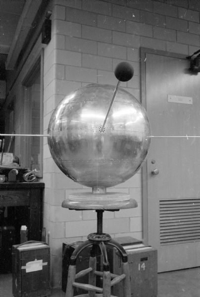 The small black sensor on the end of the antenna of a model Vanguard satellite, will detect differences in radiation as the satellite passes over the earth surface. The model was designed by Verner Suomi of the University of Wisconsin meteorology department and leader of a university team building one of the U.S. satellites.